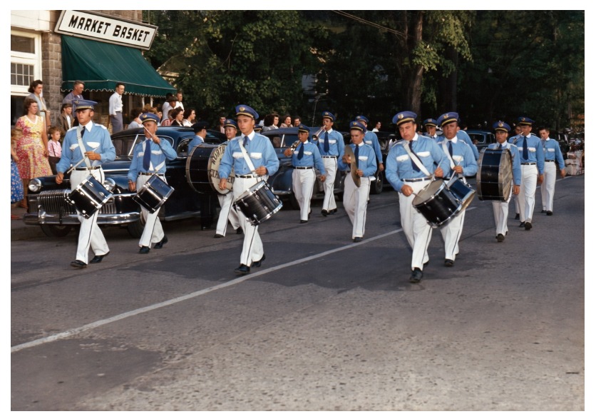The NRFD drum corps marching past the Market Basket, North Rose, N.Y.